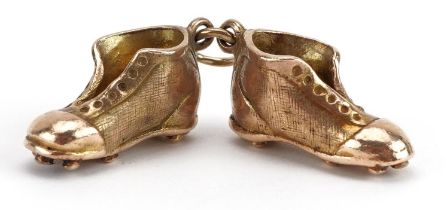 9ct gold football boots charm, 1.7cm wide, 7.2g : For further information on this lot please visit