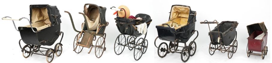 Six Victorian child's doll's prams and a bisque headed doll including Leeway and Greenfield & Marsh,