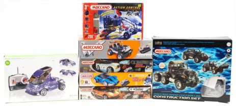 Seven Meccano radio controlled vehicle construction sets with boxes including numbers 8700, 8951,