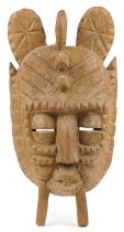 Large African tribal interest carved wood face mask, 68cm high : For further information on this lot