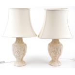 Pair of Chinese cinnabar lacquer style table lamps with silk lined shades, 73cm high : For further