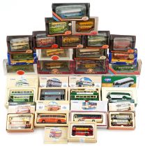 Twenty five Corgi 1:76 scale diecast buses and trams with boxes including Exclusive First