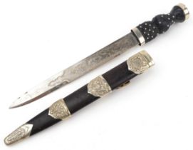 Scottish sgian dubh with ebony handle and leather scabbard, crown and crown to the top, stamped