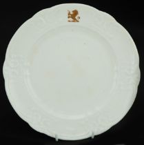 19th century Nantgarw plate moulded with C scrolls, hand painted with rampant lion heraldic crest,