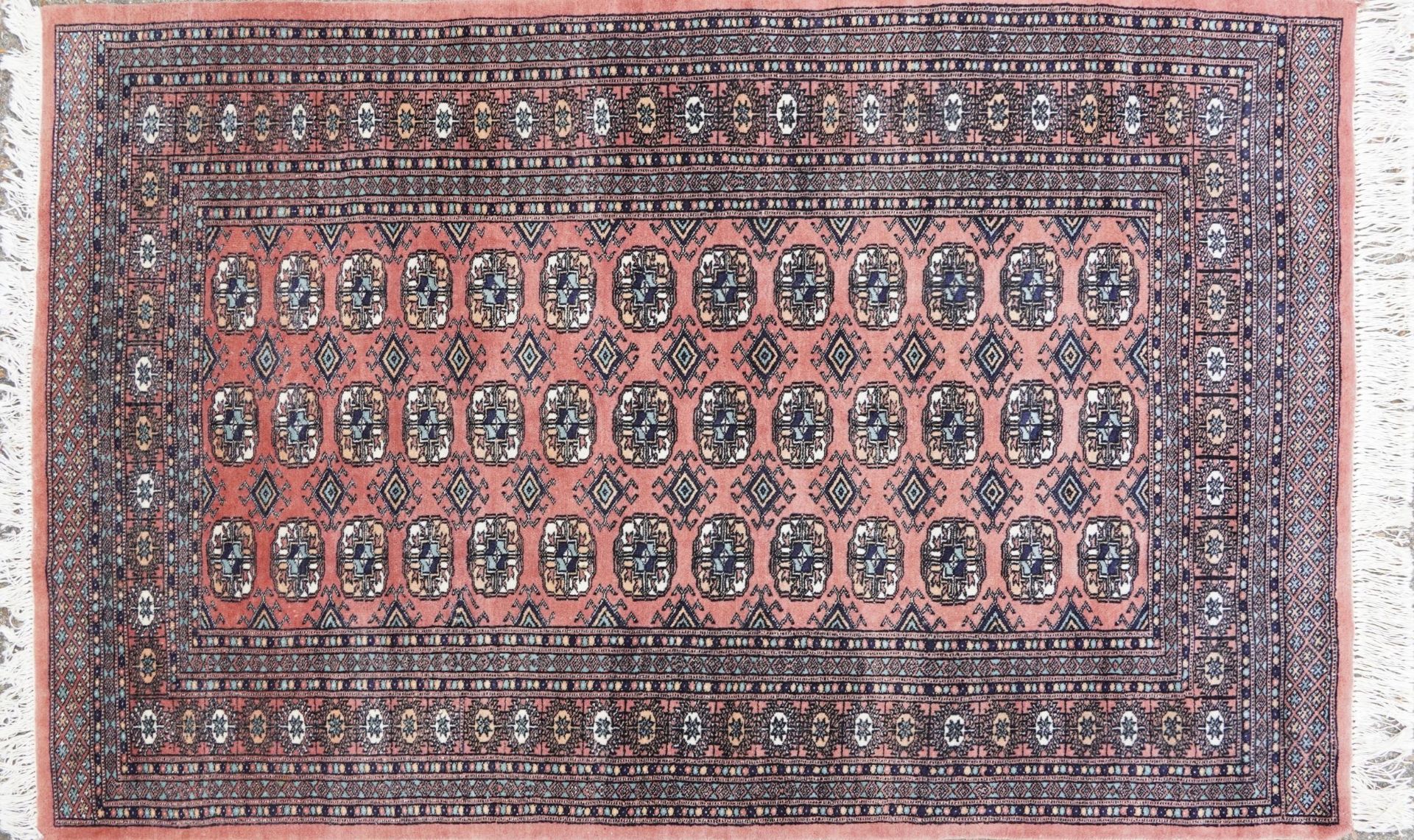 Rectangular Persian rug having an allover repeat design, 190cm x 125cm : For further information