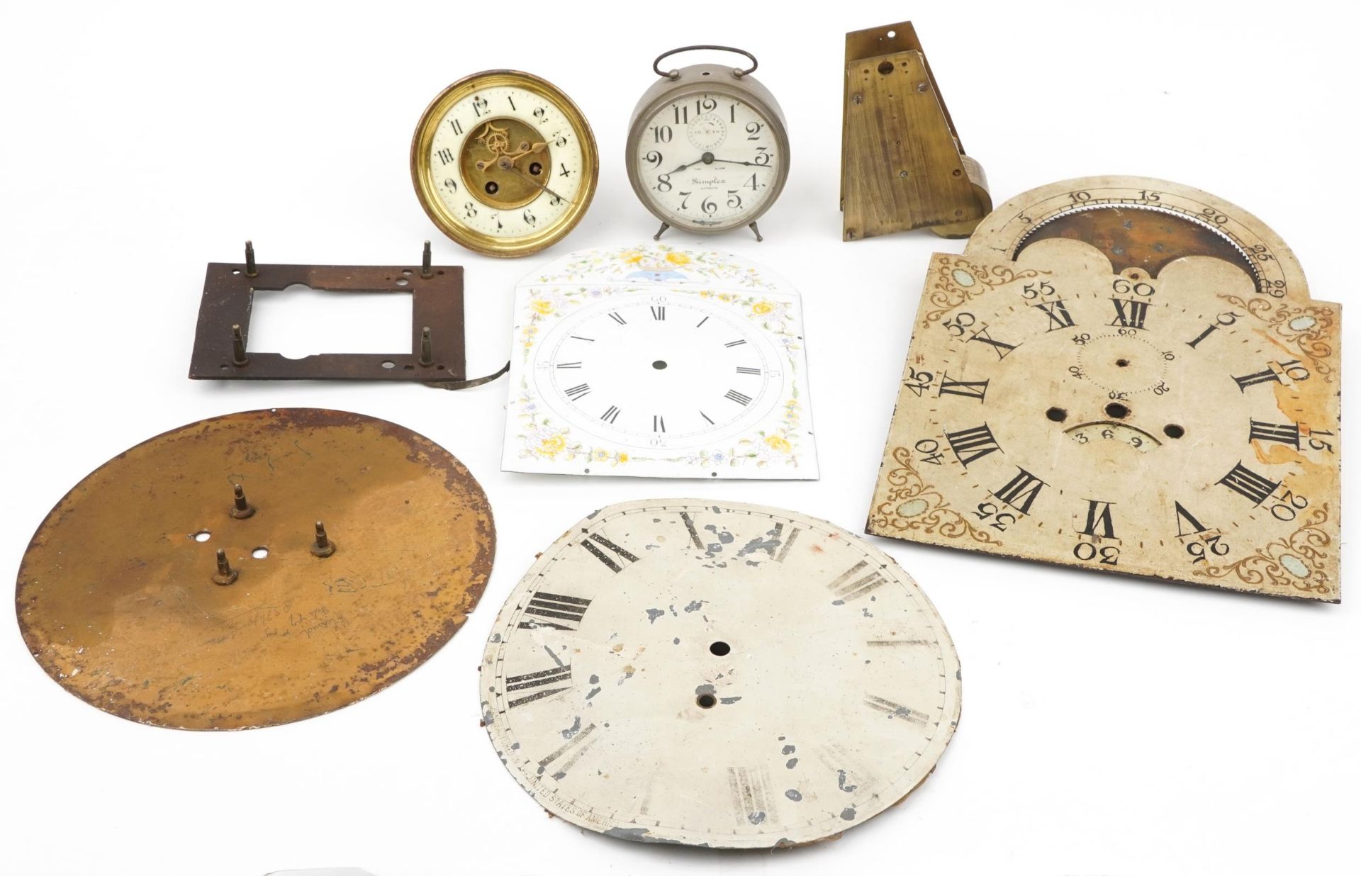 19th century and later clock movements and faces including one with painted moon phase dial, the