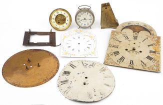 19th century and later clock movements and faces including one with painted moon phase dial, the