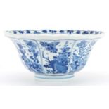 Chinese blue and white porcelain bowl hand painted with panels of flowers, six figure character