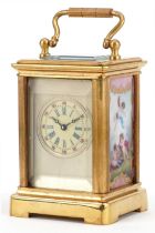 Miniature brass cased carriage clock with swing handle and Sevres style panels hand painted with