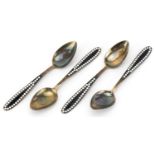 Set of four Russian silver gilt and enamel teaspoons, impressed marks to the underside, 12cm in