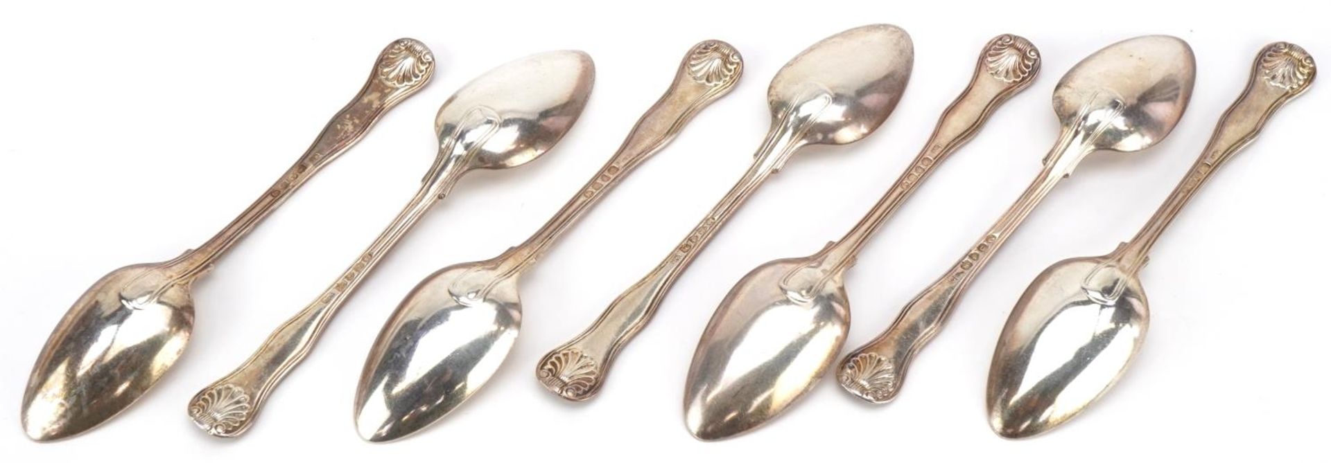 Morris & Michael Emmanuel, seven George IV matching silver spoons, London 1828, 18cm in length, - Bild 2 aus 3
