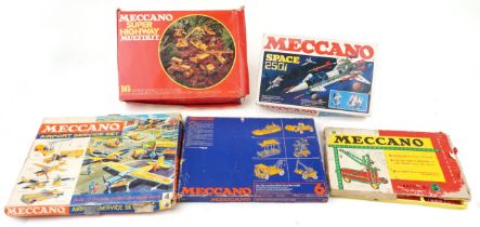 Five vintage Meccano construction sets with boxes including numbers 030206, outfit number 3 and