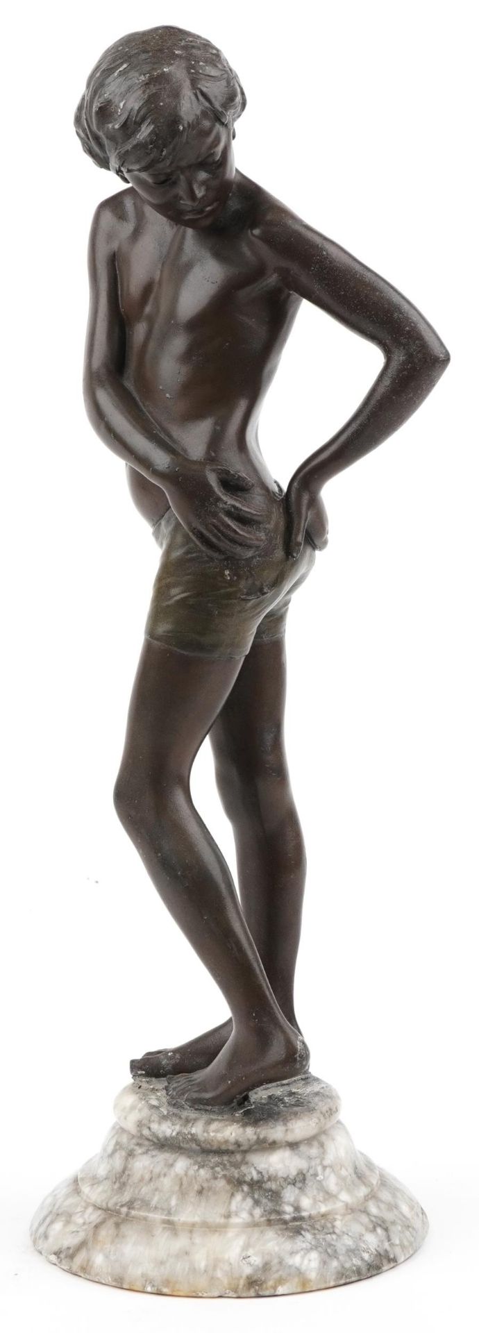 19th century patinated spelter figure of a semi nude boy raised on a circular marble base : For