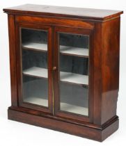 Victorian rosewood bookcase with glazed doors enclosing three adjustable shelves, 101cm H x 97cm W x