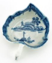 18th century Derby blue and white porcelain naturalistic butter boat, circa 1770, decorated in the