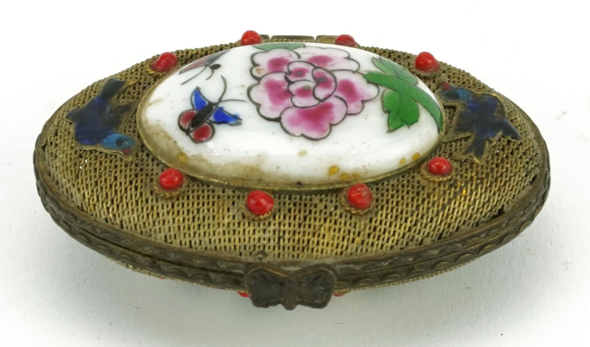 Chinese Canton bronzed filigree trinket box enamelled with flowers, having two inset porcelain