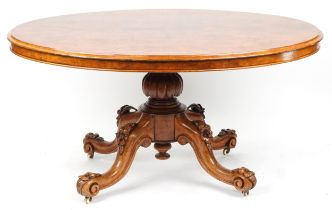 Victorian burr walnut loo table with quarter veneered top and floral carved knees and feet, 74cm H x