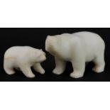 Two Art Deco style carved alabaster polar bears, the largest 19.5cm in length : For further