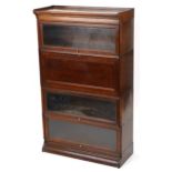 19th/20th century Globe Wernicke oak four section bookcase on stand with fall enclosing pigeon holes