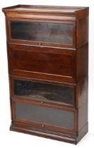 19th/20th century Globe Wernicke oak four section bookcase on stand with fall enclosing pigeon holes