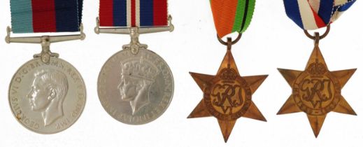 Four British military World War II medals with box of issue inscribed B G Chaplain : For further