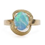 Gold opal solitaire ring, the opal approximately 9.0mm x 7.1mm, the band indistinctly marked, size