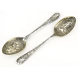 Pair of Victorian aesthetic silver plated tablespoons embossed with birds, butterflies, flowers