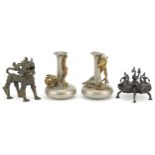 Indian and Asian metalware including a pair of pewter vases surmounted with dragons, the largest