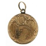 Unmarked gold open locket with engraved decoration, tests as 9ct gold, 1.9cm in diameter, 2.5g : For