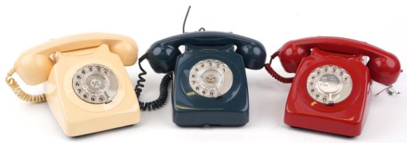 Three vintage Bakelite style dial telephones : For further information on this lot please visit