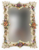 19th century German floral encrusted porcelain wall mirror with bevelled glass, 44cm x 33cm : For