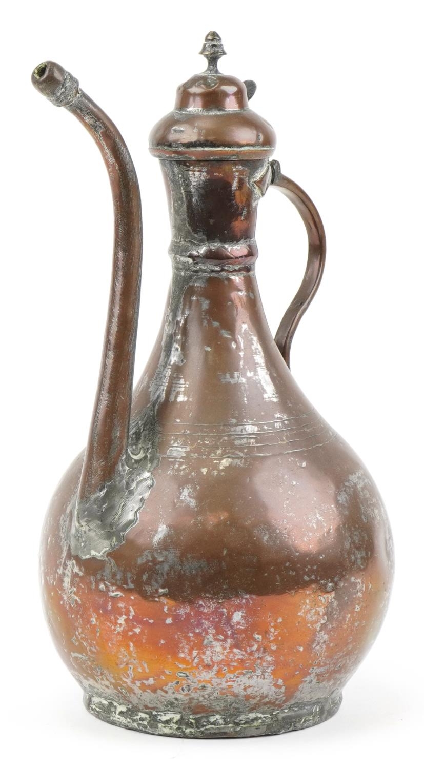 Large middle eastern copper coffee pot, 37cms tall : For further information on this lot please