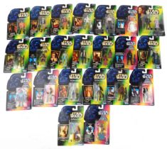 Twenty Star Wars action figures housed in sealed blister packs, some French by Kenner, including Yak