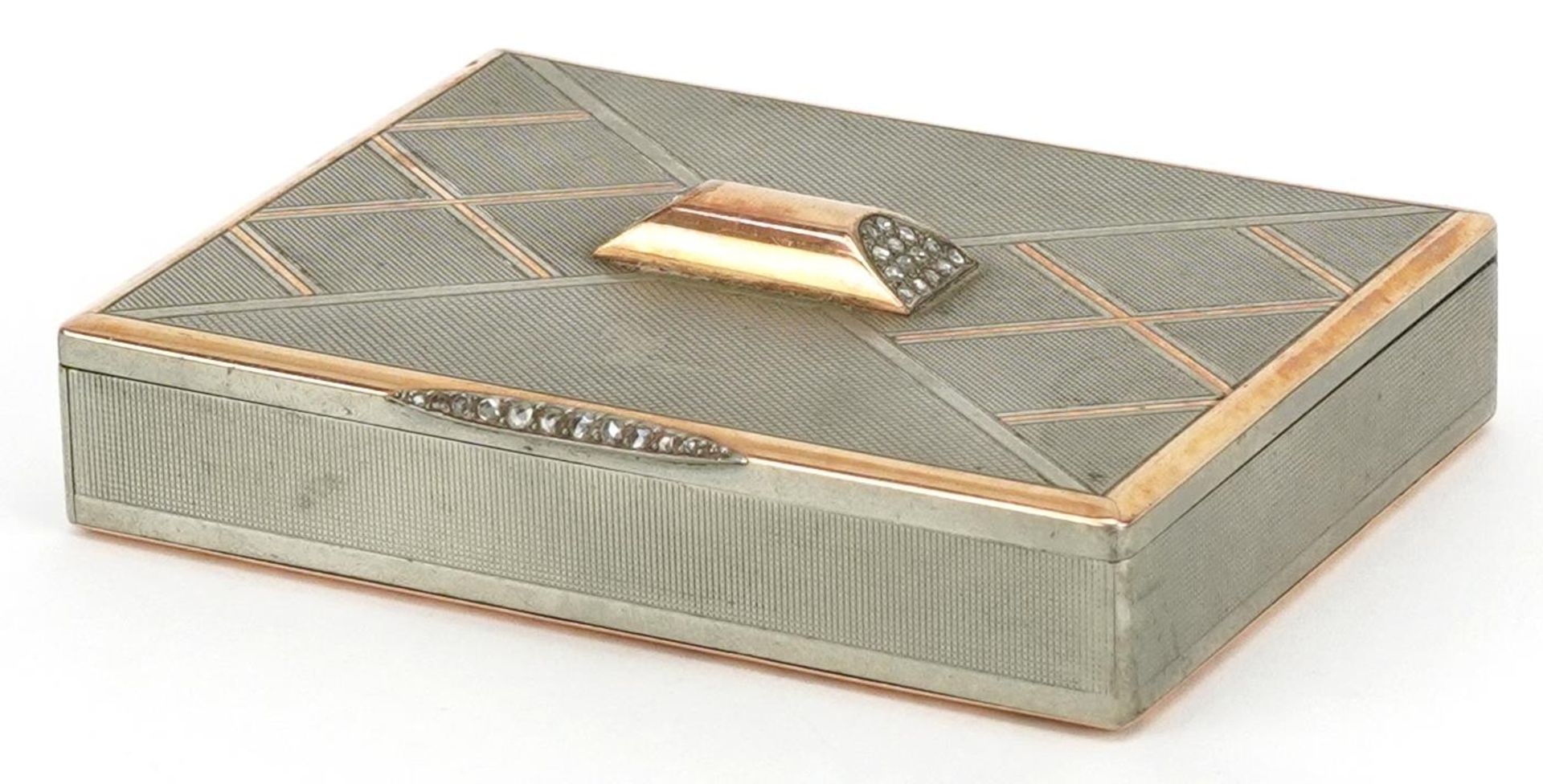 Van Cleef & Arpels, Art Deco Styptor engine turned diamond set minaudiere with rose gold overlay,