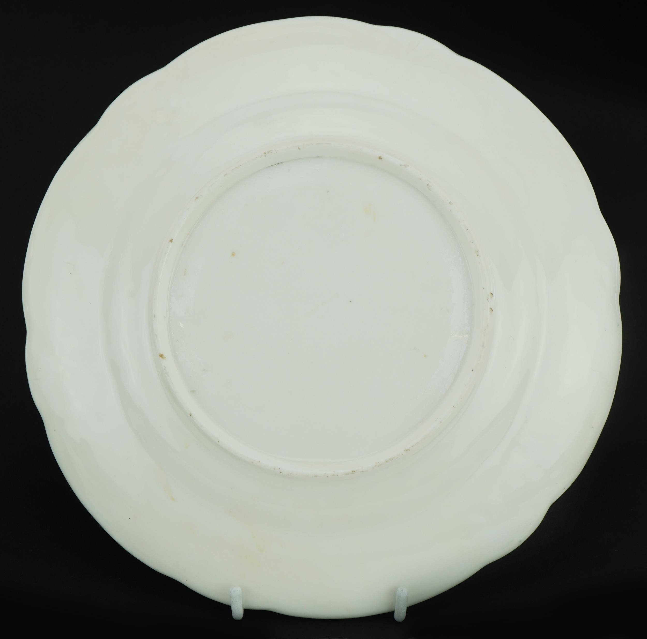 19th century Nantgarw plate moulded with C scrolls, hand painted with rampant lion heraldic crest, - Image 2 of 2