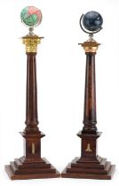 Pair of masonic oak warden's columns with globe terminals comprising Doric and Corinthian, the