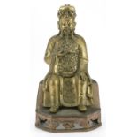 Large Chinese patinated bronze figure of an emperor wearing a dragon robe on stand, 44cm high :