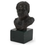 Patinated bronze bust of a Roman emperor raised on a green marble base, 14cm high : For further