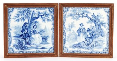 Pair of Minton China Works blue and white tiles, each housed in a hardwood frame, decorated with