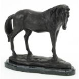 Patinated bronze study of a horse raised on a black marble base, 25cm in length : For further