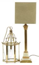 Onyx and brass standard lamp with suede shade and a hexagonal brass and glass hanging lantern, the