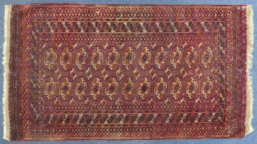 Rectangular Bokhara pink ground rug having an all over geometric design, 190cm x 104cm : For further