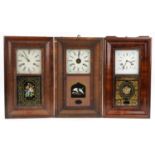 Three American walnut wall clocks with painted panels and dials having Roman numerals, each 66cm x