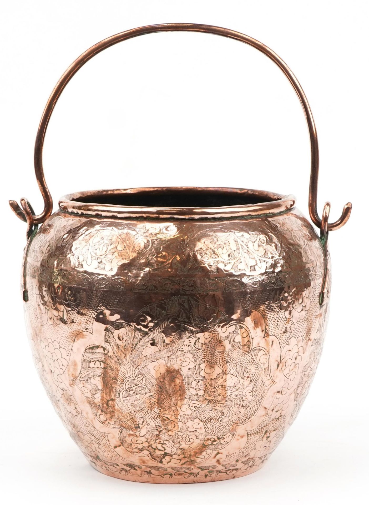 Indian copper hanging pot engraved with stylised flowers, 24cm high excluding the swing handle : For