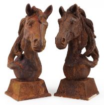 Pair of cast iron horseheads, 48cm high : For further information on this lot please visit