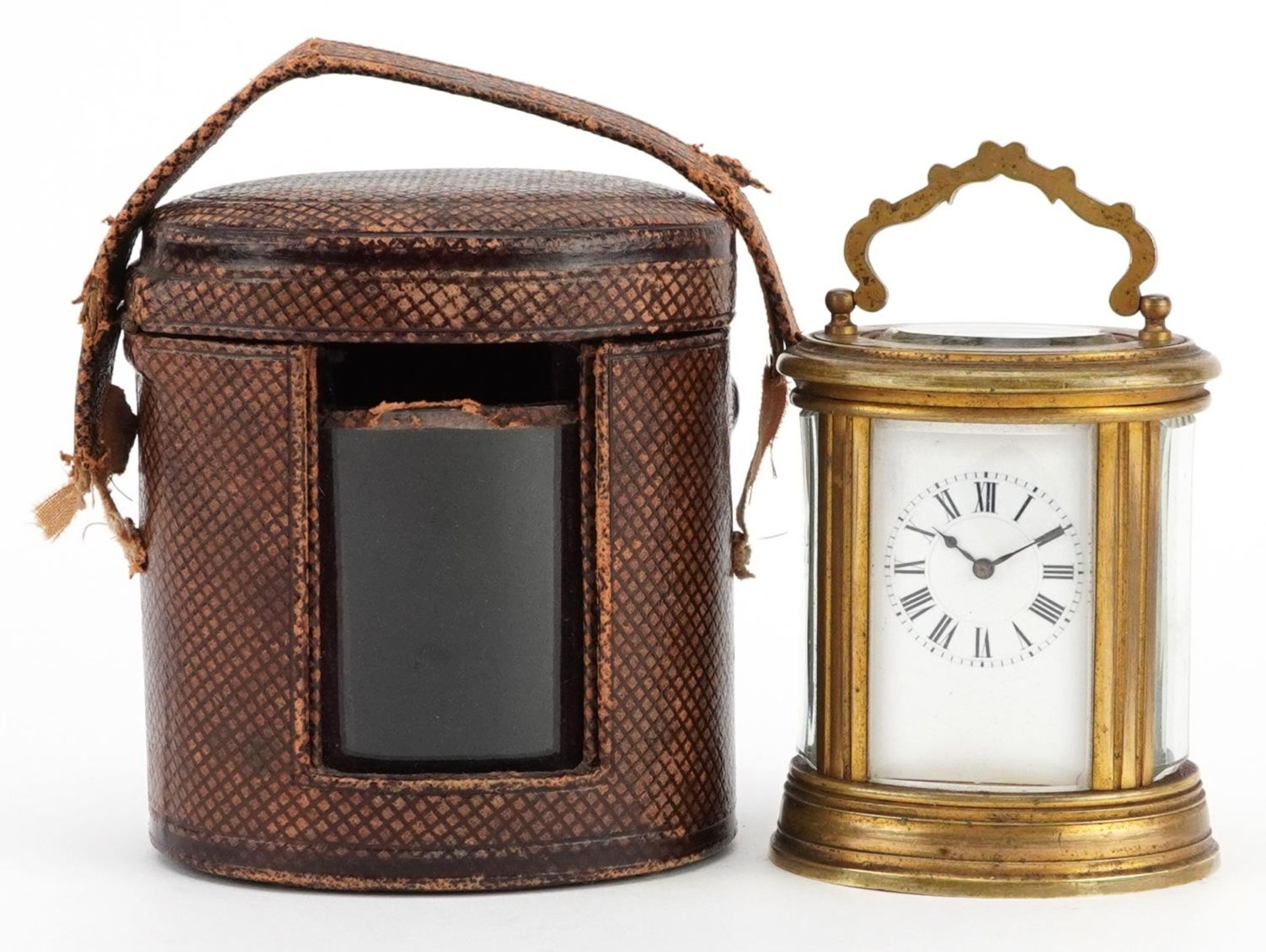 Henri Jacot, French overall gilt brass miniature carriage clock with enamelled dial and Roman