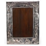 Large Art Nouveau silver plated copper easel photo frame embossed with classical figures and Putti