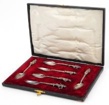 Set of six Burmese unmarked silver spoons with figural terminals housed in a fitted case, each 13.