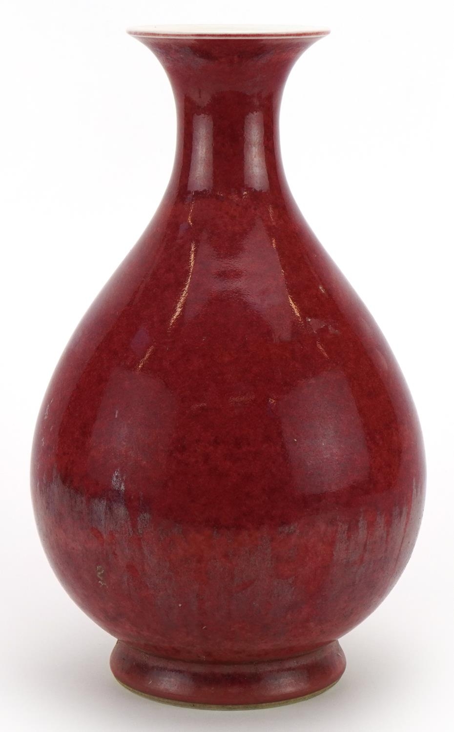 Chinese porcelain vase having a sang de boeuf glaze, six figure character marks to the base, 31cm