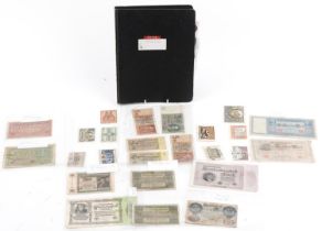 Collection of antique and later coinage and banknotes predominantly arranged in an album including